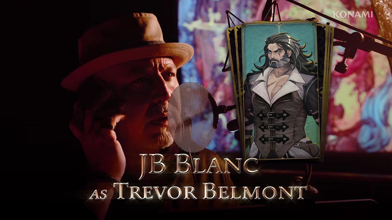 JB Blanc, who voices Trevor Belmont, in a recording booth beside the character's card, from Konami's English voice cast trailer. Image: Konami
