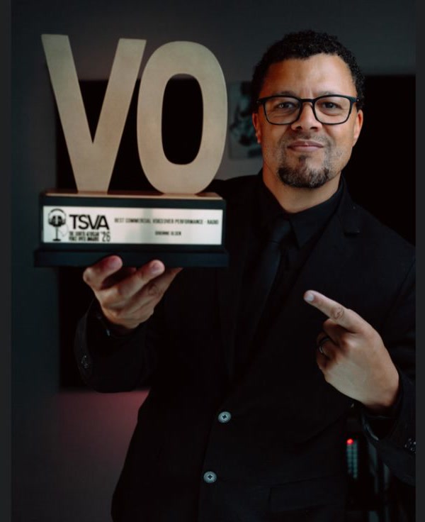 Brionne Olsen, the voice of 5FM, holding his South African Voiceover Award for Best Commercial Voiceover Performance in radio. Image: 5FM