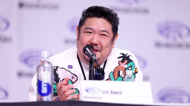 Eric Bauza speaking into a microphone on a panel at WonderCon 2026 in Anaheim, wearing a Looney Tunes shirt. Photo: Gage Skidmore, CC BY-SA 4.0
