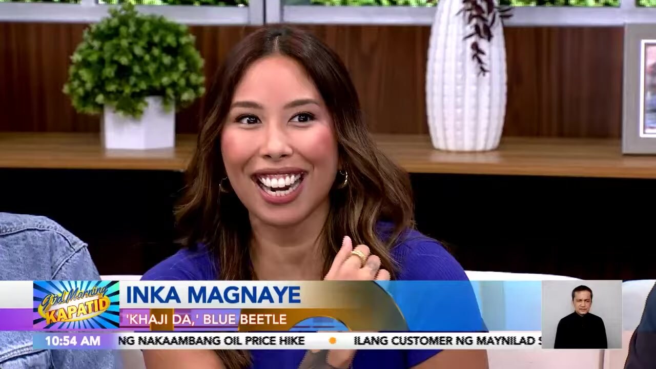 La locutora Inka Magnaye sonriendo en el set de Good Morning Kapatid, de TV5, en 2023, bajo un rótulo que la presenta como la voz de Khaji Da en Blue Beetle. Imagen: TV5 News Philippines