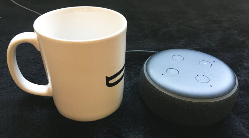 An Amazon Echo Dot smart speaker beside a coffee mug. Image: Pittigrilli, CC BY-SA 4.0